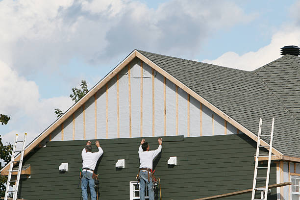 Professional Siding Installation technician working in Holbrook, PA